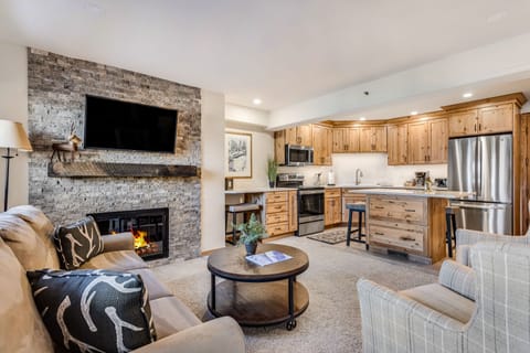 Living room with wood-burning fireplace