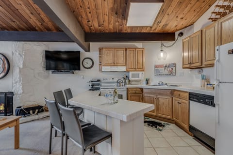 Full kitchen with bar seating