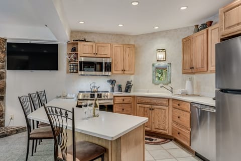 Full kitchen with counter seating
