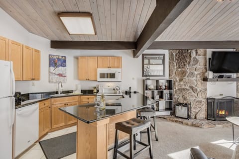 Full kitchen with bar seating