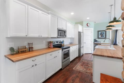Open Concept Butcher Block Kitchen.