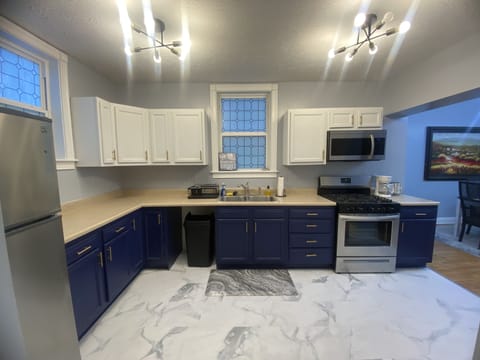 Open to dining and living area. New appliances, keurig and Mr coffee maker