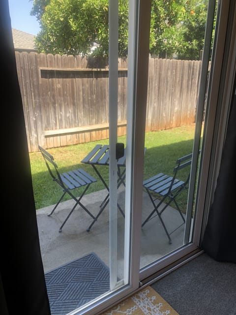 Backyard patio off downstairs bedroom