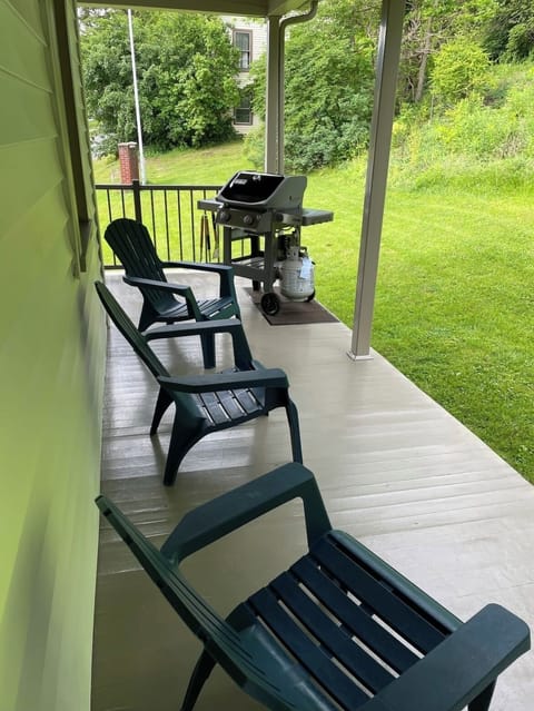 Wrap around porch with grill (fire pit not pictured)