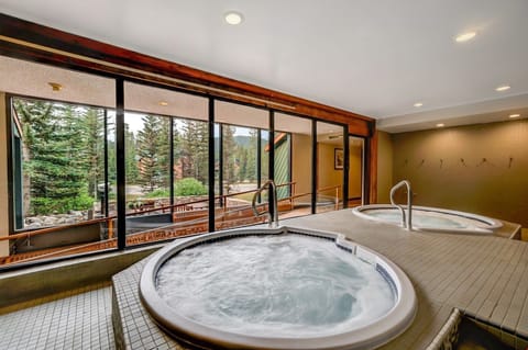 Soothe your muscles in the shared indoor hot tub