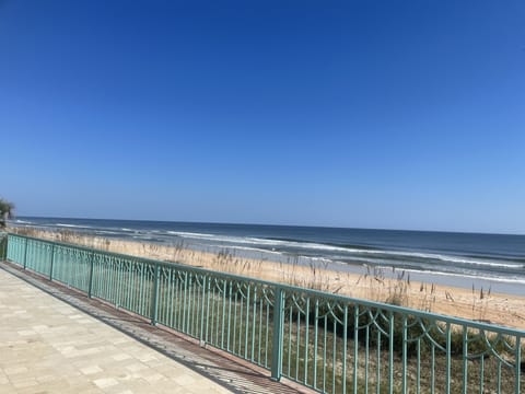 On the beach, sun loungers, beach towels