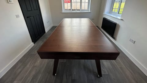 The pool table in the games room doubles up as an additional large dining table