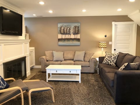 The family room is beautifully decorated and offers a pull-out couch.