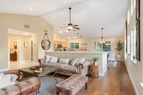 An open concept living room, dining room, and kitchen sets a perfect place to host your friends and family for a much needed getaway. Savor the flavors of a local Sonoma County wine and unwind in this luxurious space.