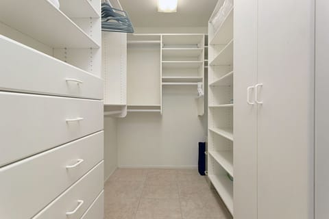 The large master bedroom closet is great for storing luggage
