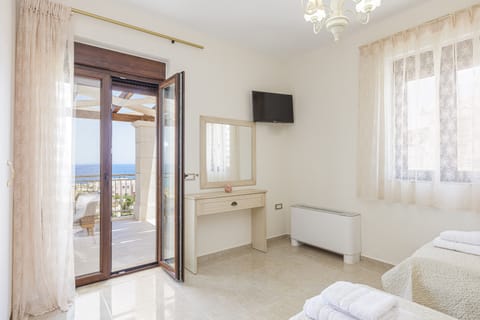 The twin bedroom also has access to the balcony.