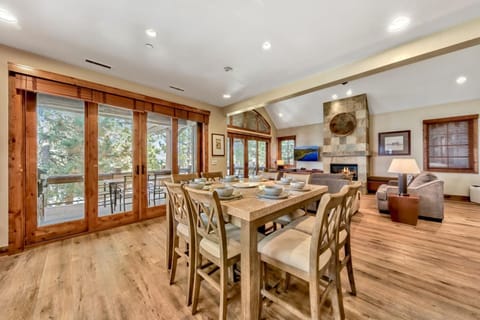 The dining table is just steps from the kitchen.