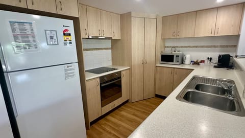 Microwave, dishwasher, dining tables