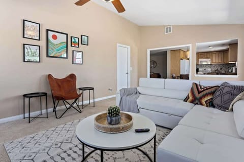 Have a glass of wine while enjoying Netflix on the comfortable sofa after exploring the desert.