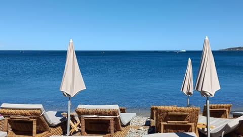 Beach nearby, sun loungers