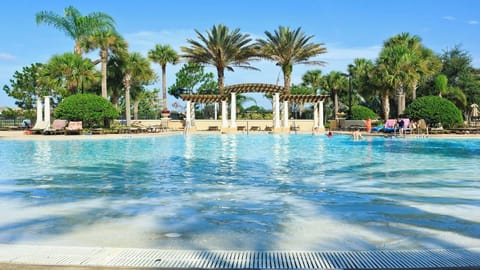 A heated pool, sun loungers