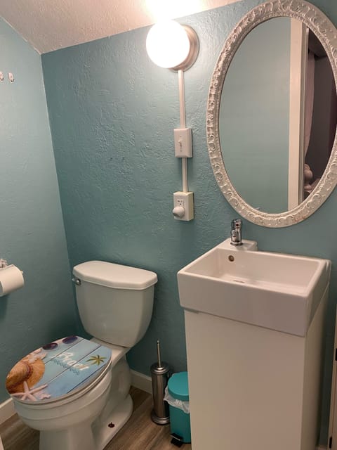 Combined shower/tub, hair dryer, towels, soap