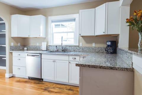 Enjoy mornings in this bright kitchen—brew fresh coffee, prep breakfast, and start your day relaxed.