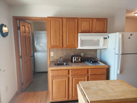 Fridge, microwave, toaster, cookware/dishes/utensils