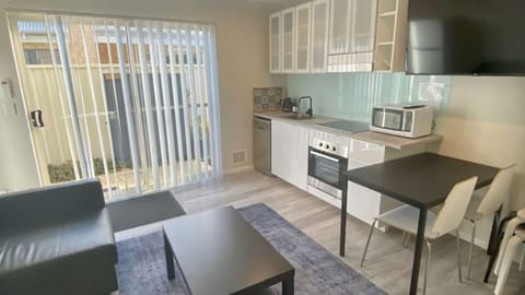 Full-size fridge, dishwasher, freezer, dining tables