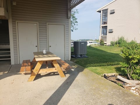 Covered area with picnic table that belongs to this condo only