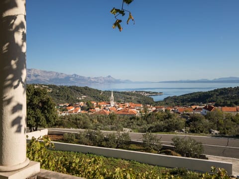 Sky, Water, Daytime, Plant, Azure, Botany, Vegetation, Building, Mountain, Landscape