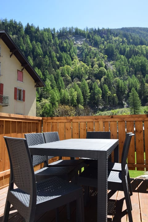 Balcony accessible from kitchen/dining area.