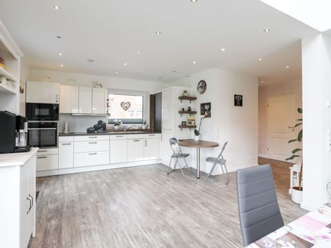 Property, Wood, Lighting, Cabinetry, Living Room, Flooring, Countertop, Interior Design, Floor