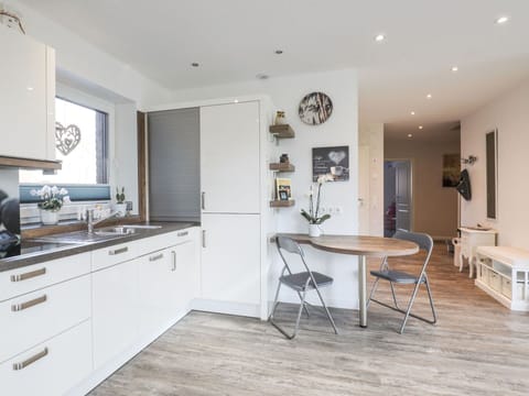 Furniture, Cabinetry, Property, Countertop, Wood, Table, Interior Design, Chair, Flooring