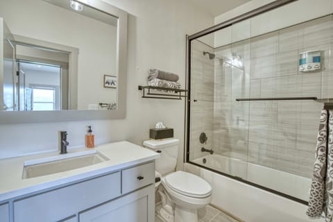 Combined shower/tub, hair dryer, towels, soap