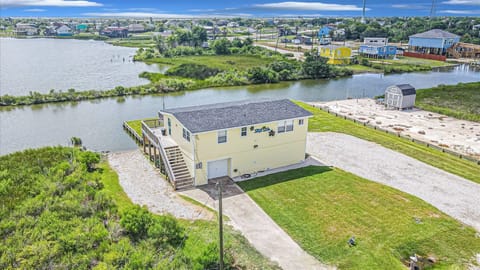Aerial view, with two large driveways