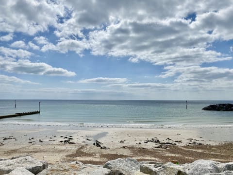 On the beach, sun loungers