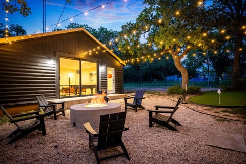 Evenings are magical with outdoor seating, string lights, and your private bonus game room steps away.
