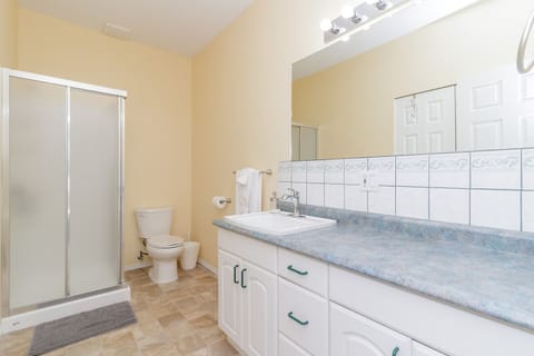 Combined shower/tub, hair dryer, towels, toilet paper