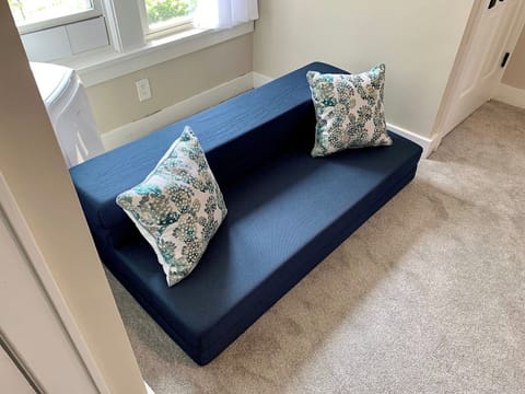 Fold out 4" floor mattress (couch), is located in the closet off of the living room for additional guests who wish to use it.