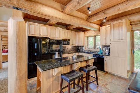 Kitchen Area with Extensive Wood Beams