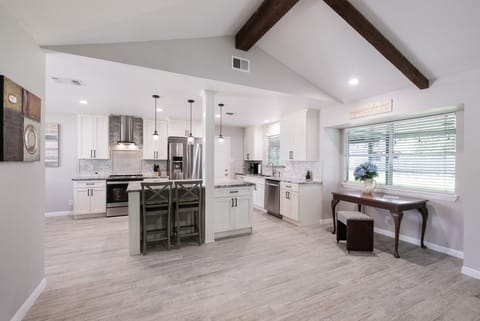 Table can be used as home office, full Wifi and nice backyard view.