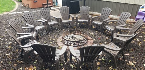 Chat w/ family & friends around a campfire. Wood & roasting sticks provided