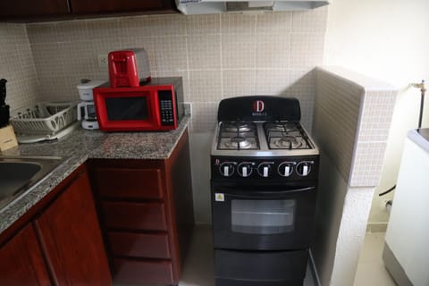 Microwave, coffee/tea maker, cookware/dishes/utensils