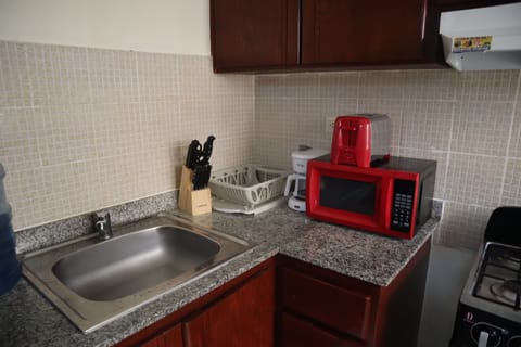 Microwave, coffee/tea maker, cookware/dishes/utensils