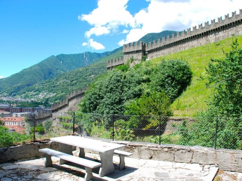 Cloud, Sky, Plant, Nature, Building, Mountain, Outdoor Bench, Vegetation, Biome, Natural Landscape