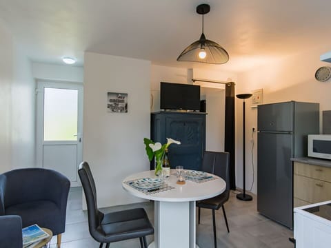 Property, Furniture, Table, Cabinetry, Blue, Chair, Lighting, Interior Design, Wood, Flooring