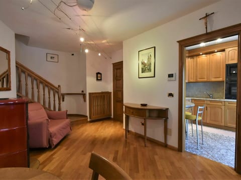 Furniture, Countertop, Wood, Couch, Cabinetry, Comfort, Lighting, Interior Design, Living Room, Floor