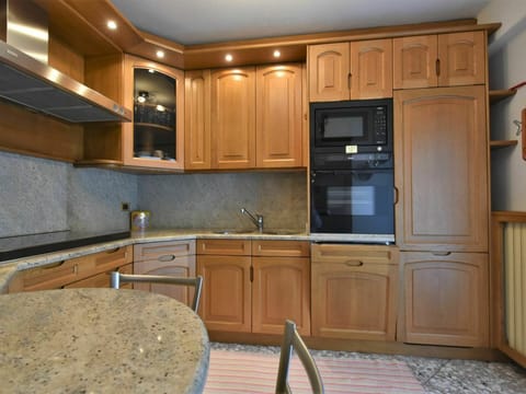 Brown, Countertop, Cabinetry, Property, Furniture, Building, Kitchen, Kitchen Appliance, Kitchen Sink, Wood