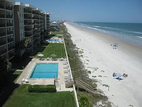 On the beach, sun loungers, beach towels