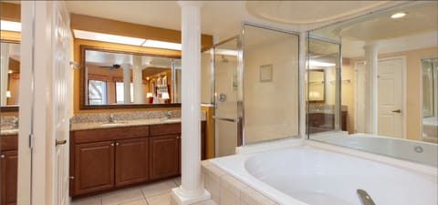 Bathtub, jetted tub, towels, soap