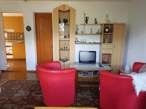 apartment with doors to kitchen and bathroom