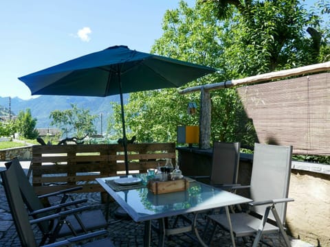 Table, Sky, Furniture, Plant, Property, Building, Chair, Outdoor Table, Shade, Outdoor Furniture