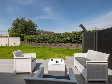 Furniture, Outdoor Furniture, Chair, Garden, Patio, Outdoor Table, Shade, Landscaping, Armrest