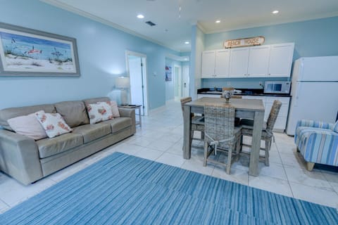 Entry floor living area by the pool.